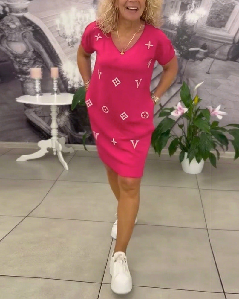 Lyrael™ - V-ringad knälång klänning